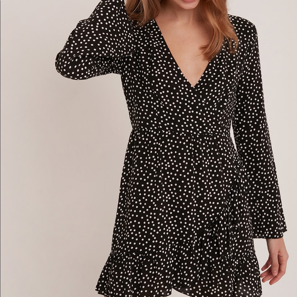 Polka dot V-neck wrap dress.